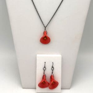 Red flower necklace and earrings set.