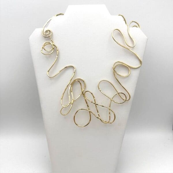 Gold Hammered Swirl Aluminum Necklace